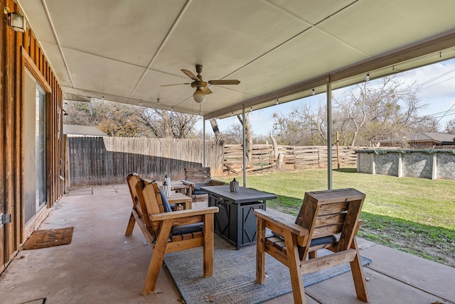 view of patio featuring ceiling fan