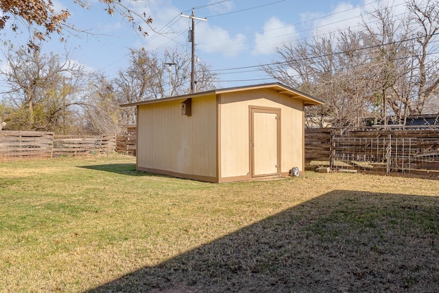 view of outdoor structure with a yard