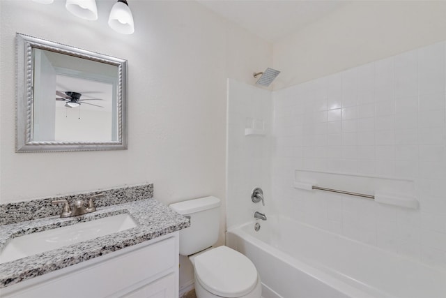 full bathroom featuring vanity, bathtub / shower combination, ceiling fan, and toilet