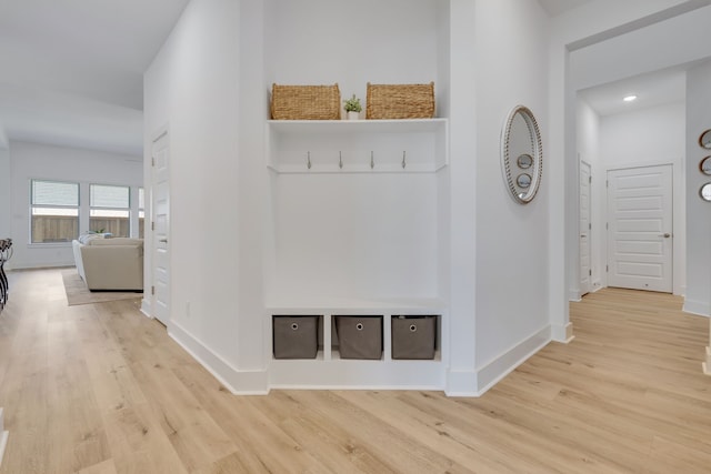 mudroom with light wood-type flooring