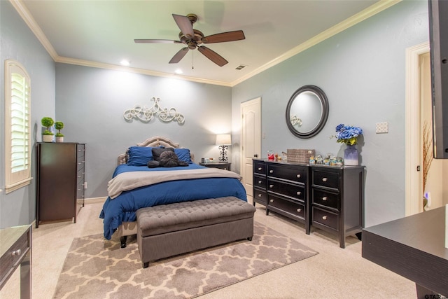 carpeted bedroom with ceiling fan and crown molding