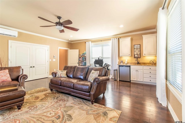 living room featuring ornamental molding, ceiling fan, dark wood-type flooring, and sink