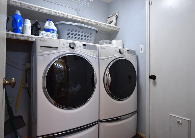 laundry area featuring washing machine and dryer