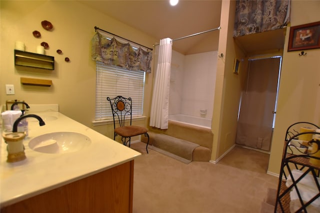 bathroom with vanity and shower / tub combo with curtain