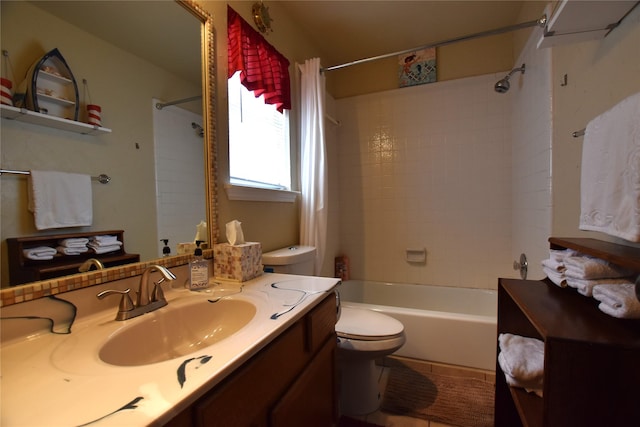 full bathroom featuring shower / bath combo with shower curtain, vanity, and toilet