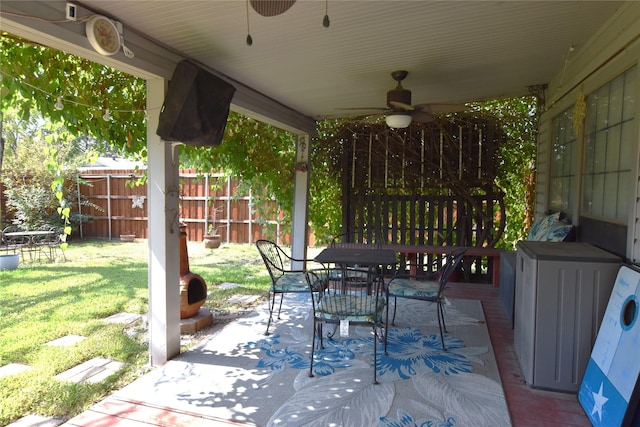 view of patio featuring ceiling fan