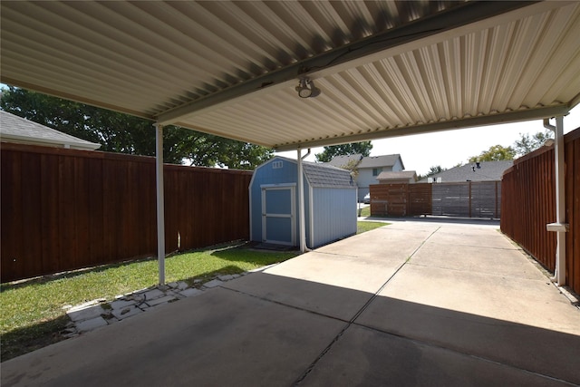 view of patio / terrace featuring a storage shed