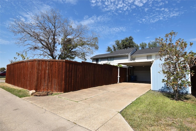 view of property exterior featuring a carport