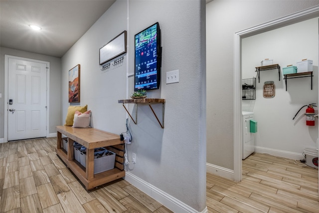 foyer with washer / clothes dryer