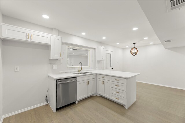 kitchen with white cabinetry, dishwasher, light hardwood / wood-style floors, and sink