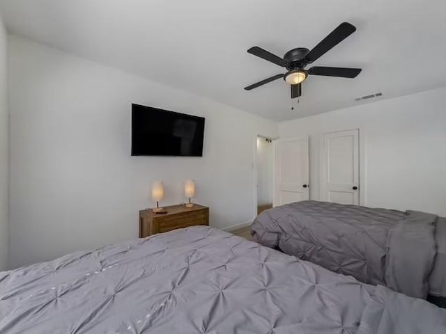 unfurnished bedroom featuring ceiling fan