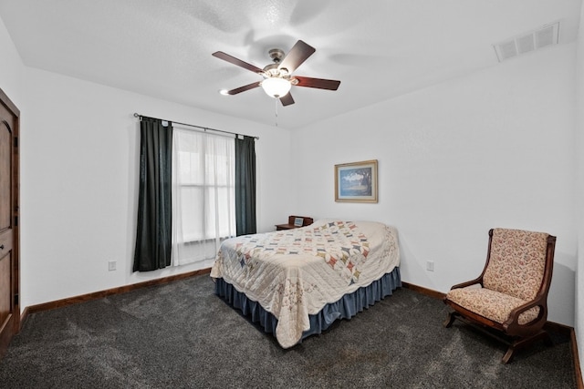 carpeted bedroom with ceiling fan