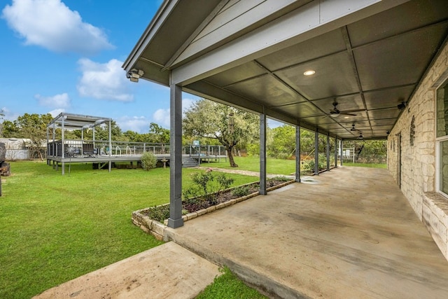 view of patio / terrace featuring ceiling fan and a pergola