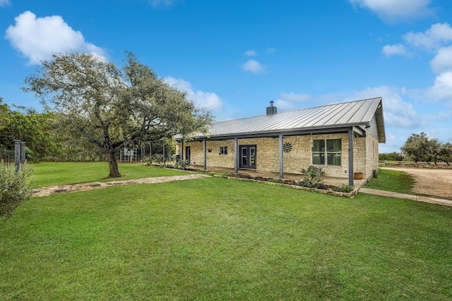 exterior space with a lawn