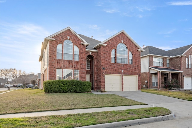 front facade with a front yard and a garage