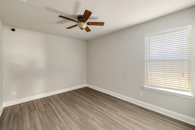 unfurnished room featuring wood-type flooring and ceiling fan