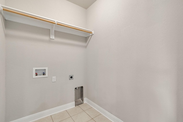 washroom with light tile patterned floors, electric dryer hookup, and hookup for a washing machine