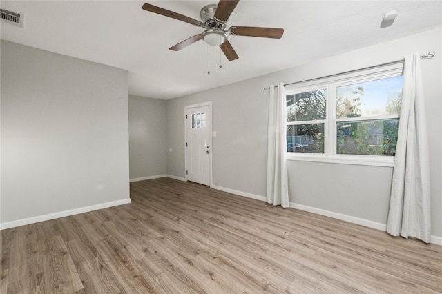 foyer featuring ceiling fan and light hardwood / wood-style floors