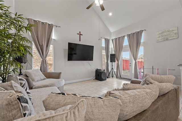 living room with ceiling fan, light tile patterned floors, and high vaulted ceiling