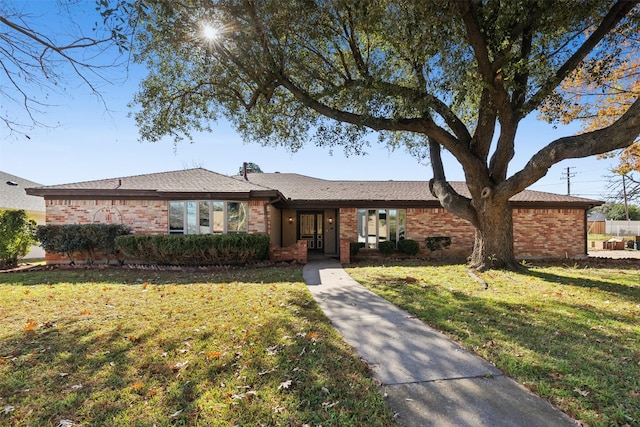 ranch-style house with a front yard