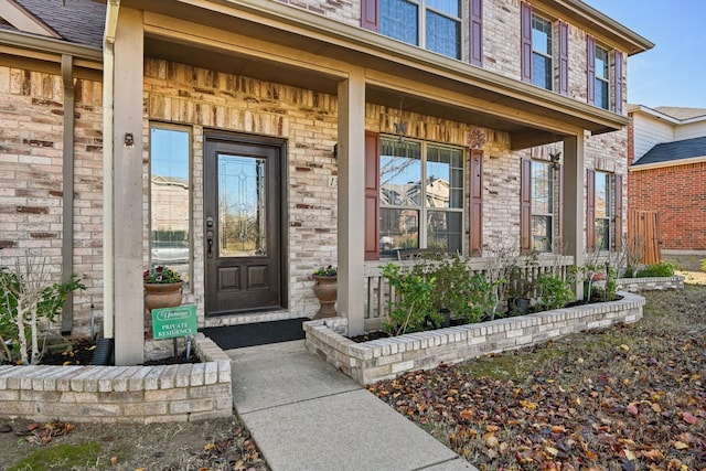 property entrance with a porch