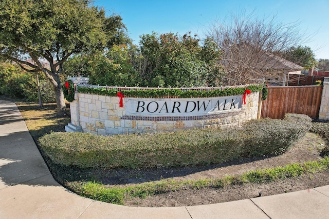 view of community sign