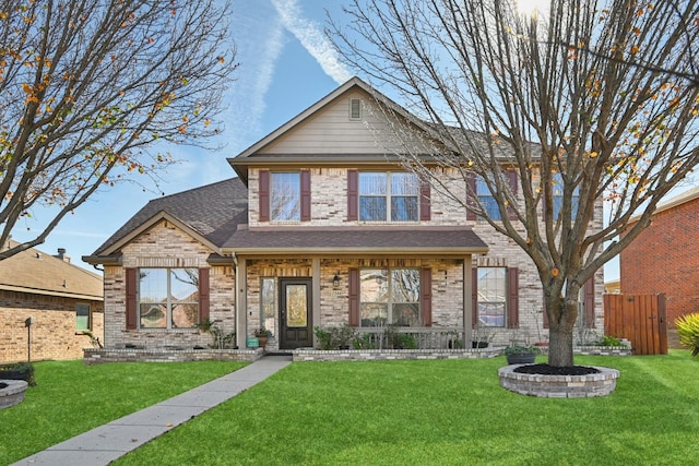 craftsman-style house with a front yard