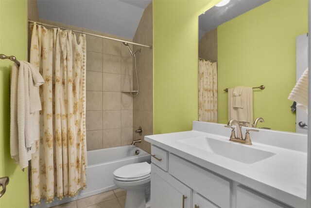 full bathroom with shower / bath combination with curtain, toilet, vanity, and tile patterned flooring