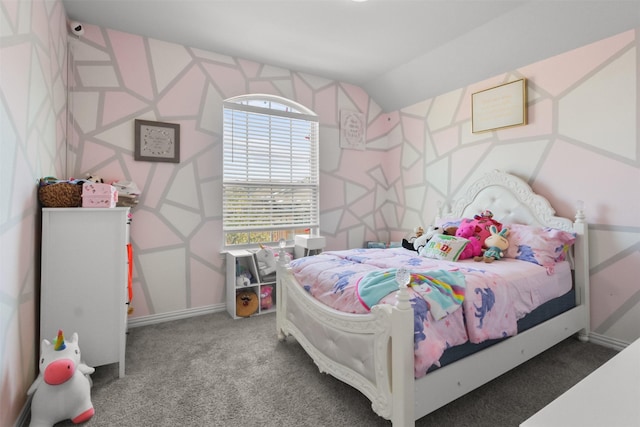 carpeted bedroom with vaulted ceiling