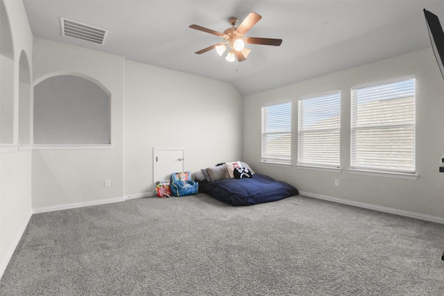 unfurnished bedroom featuring ceiling fan and carpet floors