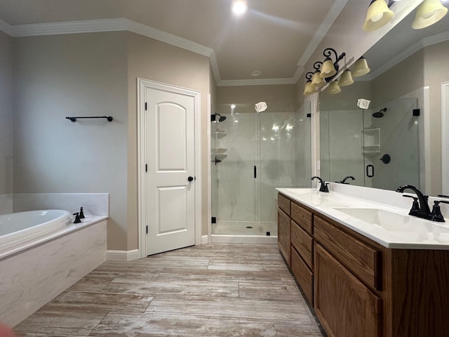 bathroom with vanity, ornamental molding, and plus walk in shower