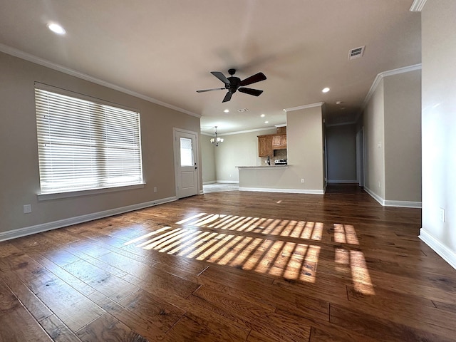 unfurnished living room featuring dark wood-type flooring, ceiling fan with notable chandelier, and ornamental molding