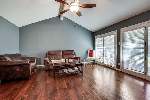 living room featuring ceiling fan, plenty of natural light, lofted ceiling with beams, and dark hardwood / wood-style floors