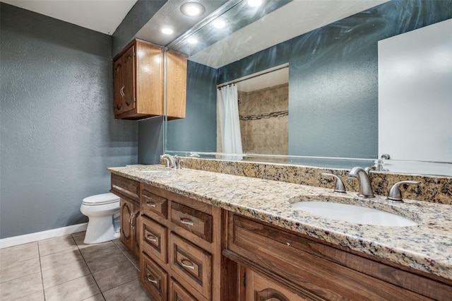 bathroom featuring a shower with shower curtain, vanity, toilet, and tile patterned flooring