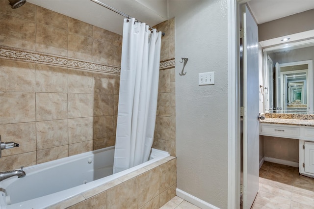 bathroom featuring tile patterned floors, vanity, and shower / bathtub combination with curtain