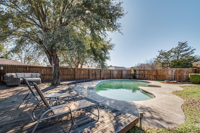 view of pool featuring outdoor lounge area and a patio