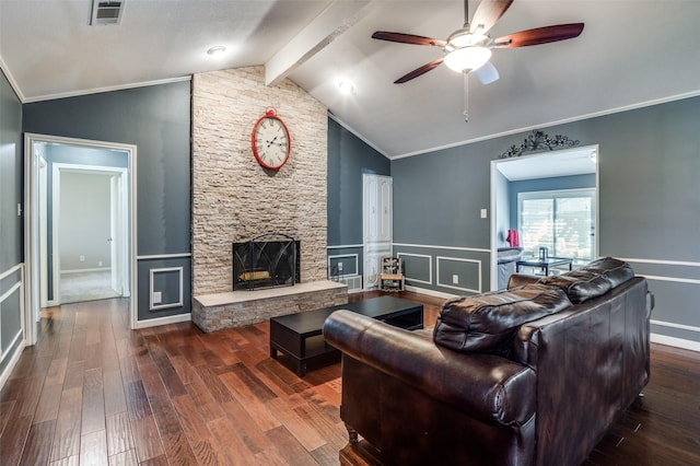 living room with ceiling fan, crown molding, lofted ceiling with beams, and dark hardwood / wood-style floors