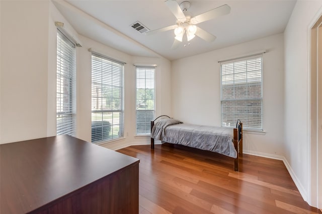 bedroom featuring hardwood / wood-style floors and ceiling fan