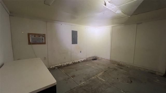 basement featuring electric panel and a wall mounted AC