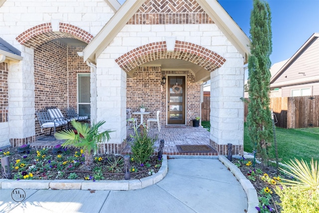 doorway to property featuring a porch