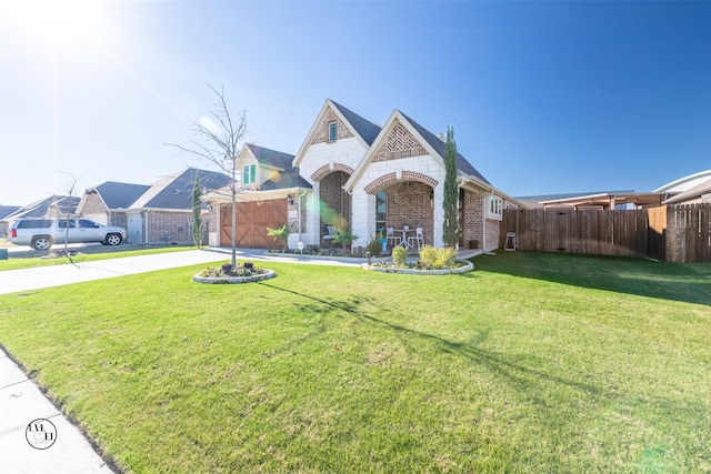 view of front of house featuring a front lawn