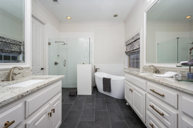 bathroom featuring tile patterned floors, vanity, ornamental molding, and plus walk in shower