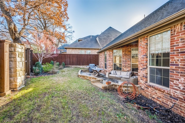 view of yard featuring a patio area and an outdoor hangout area