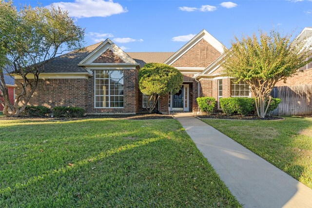 view of front of home with a front lawn