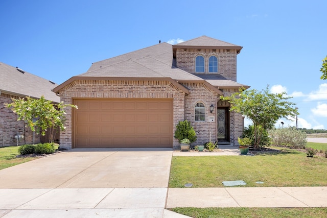 view of front facade featuring a front lawn and a garage