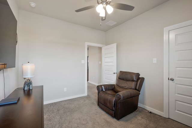 sitting room featuring ceiling fan and light colored carpet