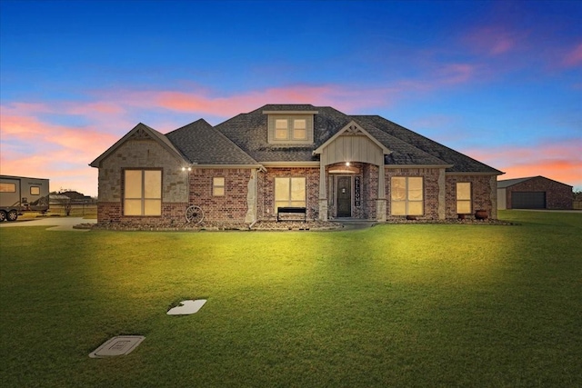 craftsman-style house featuring a yard