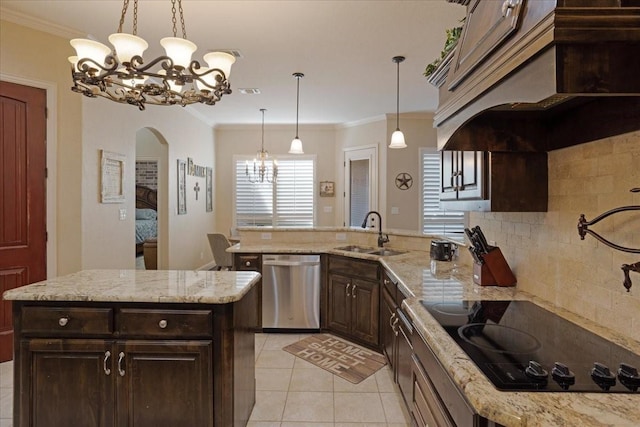 kitchen featuring sink, hanging light fixtures, light stone counters, stainless steel dishwasher, and black electric stovetop