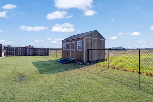 view of outdoor structure with a lawn