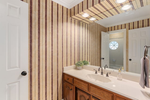 bathroom with vanity, shower / bathtub combination, and ornamental molding